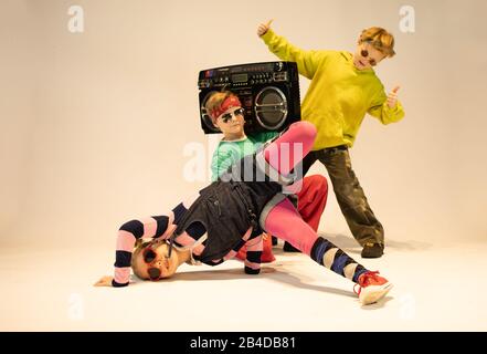 unique kids,cheerful children dressed in hip hop style,dancing kids, break dance kids Stock Photo