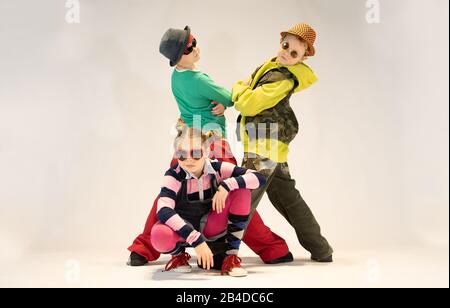 unique kids,cheerful children dressed in hip hop style,dancing kids, break dance kids Stock Photo