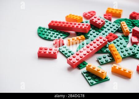 Russia, saint-petersburg, 02 august 2019, pile plastic toy blocks.Multicolored plastic building blocks of the designer. Children's constructors, cubes Stock Photo