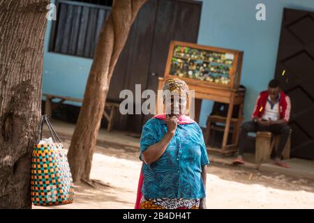 Tanzania, northern Tanzania at the end of the rainy season in May, Serengeti National Park, Ngorongoro Crater, Tarangire, Arusha and Lake Manyara, Masai woman at the village road Stock Photo