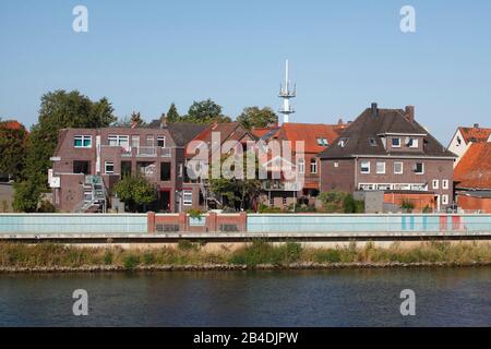 Weser riverside promenade with residential houses, Hoya, Lower Saxony, Germany, Europe Stock Photo