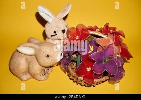 The Easter Bunny also called the Easter Rabbit is a folkloric figure and symbol of Easter, depicted as a rabbit bringing Easter eggs Stock Photo