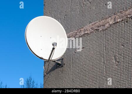 satellite dish on the wall Stock Photo