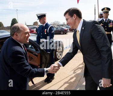 Arlington, United States Of America. 05th Mar, 2020. Arlington, United States of America. 05 March, 2020. U.S. Secretary of Defense Mark Esper, right, welcomes the British Defense Minister Ben Wallace during arrival ceremonies at the Pentagon March 5, 2020 in Arlington, Virginia. Credit: Marvin Lynchard/DOD/Alamy Live News Stock Photo