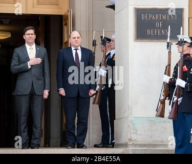 Arlington, United States Of America. 05th Mar, 2020. Arlington, United States of America. 05 March, 2020. U.S. Secretary of Defense Mark Esper, left, stands with the British Defense Minister Ben Wallace during arrival ceremonies at the Pentagon March 5, 2020 in Arlington, Virginia. Credit: Marvin Lynchard/DOD/Alamy Live News Stock Photo