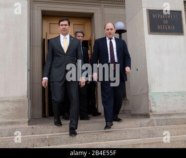 Arlington, United States Of America. 05th Mar, 2020. Arlington, United States of America. 05 March, 2020. U.S. Secretary of Defense Mark Esper, left, escorts the British Defense Minister Ben Wallace during arrival ceremonies at the Pentagon March 5, 2020 in Arlington, Virginia. Credit: Marvin Lynchard/DOD/Alamy Live News Stock Photo