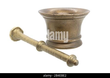 Old bronze mortar and pestle isolated on white background. Pestle in a mortar, plaque on the metal side of old age. Stock Photo