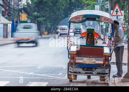 Laos, Vientiane, downtown traffic, dawn Stock Photo