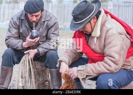 Cowboy drinking mate tea, Torres del Paine National Park, Patagonia, Chile, South America Stock Photo