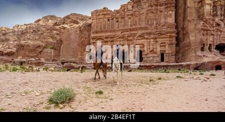 Two Mounted Police Patrol Petra, Jordan Stock Photo