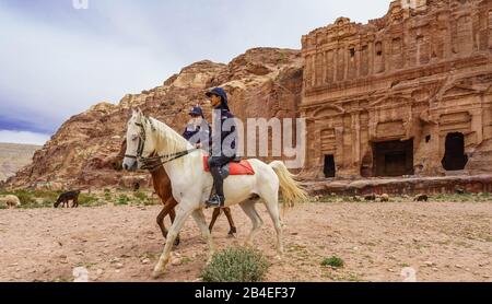 Two Mounted Police Patrol Petra, Jordan Stock Photo