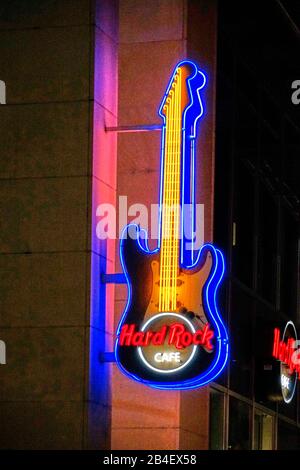 Germany, North Rhine-Westphalia, Cologne, Hard Rock Cafe, outside, guitar, neon lights, evenings Stock Photo