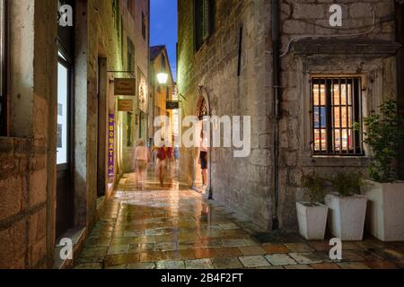 Old Town alley at night, Kotor, Montenegro Stock Photo