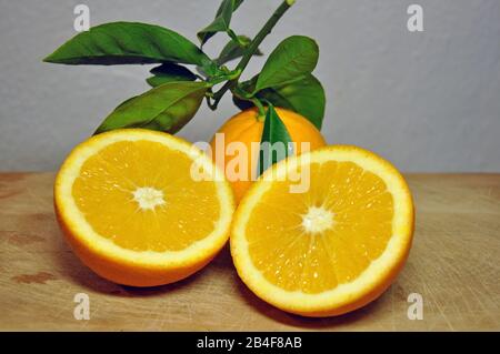 oranges on wood background Stock Photo