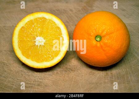 oranges on wood background Stock Photo