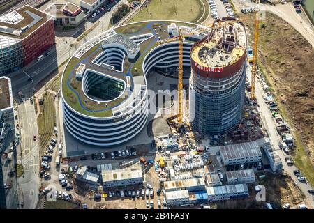 Aerial view, Trivago headquarters, construction site, in Dusseldorf Medienhafen, the new headquarters of the world's largest hotel search engine trivago, Kesselstrasse, Dusseldorf, Rhineland, North Rhine-Westphalia, Germany Stock Photo