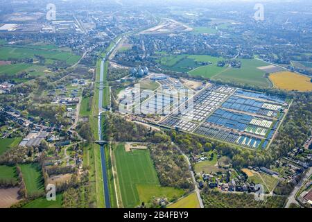 Aerial view of the sewage treatment plant Emscher estuary on the city boundary between Duisburg, Dinslaken and Oberhausen in the Ruhr area in the federal state of North Rhine-Westphalia, Germany Stock Photo