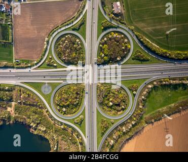 Aerial crossroads clover leaf B61 and B65 on the city boundary Porta Westfalica and the city of Minden in East Westphalia, North Rhine-Westphalia, Germany Stock Photo