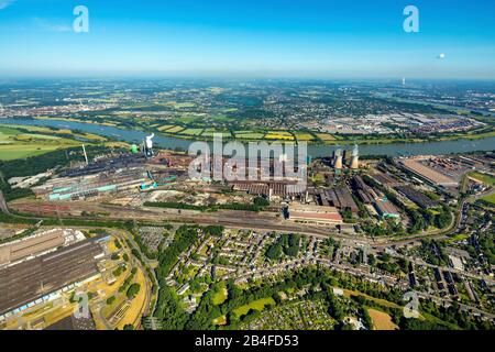 Aerial view of the steelworks Hüttenwerke Krupp Mannesmann GmbH HKM in Hüttenheim on the Rhine with coking plant Hüttenheim in Duisburg in the Ruhr area in the federal state North Rhine-Westphalia in Germany, Stock Photo