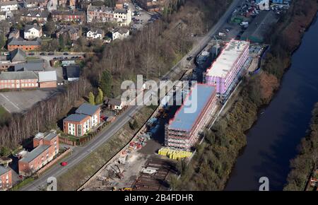 aerial view of a two new apartment blocks development being built on Station Road, Latchford, Warrington, Cheshire Stock Photo