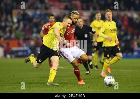 NOTTINGHAM, ENGLAND - MARCH 7TH Shane Ferguson (11) of Millwall battles with John Bostock (13) of Nottingham Forest during the Sky Bet Championship match between Nottingham Forest and Millwall at the City Ground, Nottingham on Saturday 7th March 2020. (Credit: Jon Hobley | MI News) Photograph may only be used for newspaper and/or magazine editorial purposes, license required for commercial use Credit: MI News & Sport /Alamy Live News Stock Photo