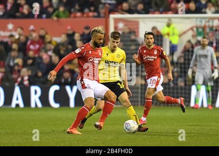 NOTTINGHAM, ENGLAND - MARCH 7TH John Bostock (13) of Nottingham Forest battles with Jayson Molumby (16) of Millwall during the Sky Bet Championship match between Nottingham Forest and Millwall at the City Ground, Nottingham on Saturday 7th March 2020. (Credit: Jon Hobley | MI News) Photograph may only be used for newspaper and/or magazine editorial purposes, license required for commercial use Credit: MI News & Sport /Alamy Live News Stock Photo