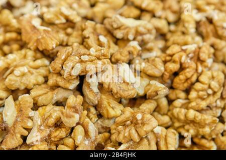 Background and texture of peeled walnuts. Close up. Stock Photo