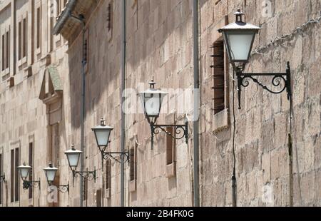 Old street lamps in Calle de la Campania street, Salamanca, Castilla y Leon, Castilla-Leon, Spain, Europe Stock Photo