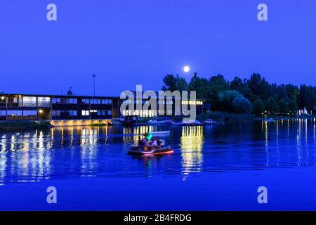 Wien / Vienna, oxbow lake Alte Donau (Old Danube), boat, sports facility of Polizeisportvereinigung (police sports association), full moon in 22. Donaustadt, Wien, Austria Stock Photo