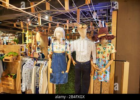 BANGKOK, THAILAND - JUNE 21, 2015: clothes on display at a store in Siam Center. Siam Center was built in 1973 as one of Bangkok's first shopping mall Stock Photo
