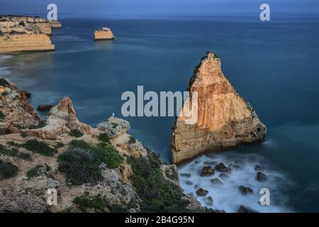 Magnificent seascape of the beach of Marinha before sunset Algarve.