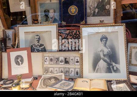 Shop window with photographs of Italian royal King Victor Emmanuel III and Queen Elena Stock Photo