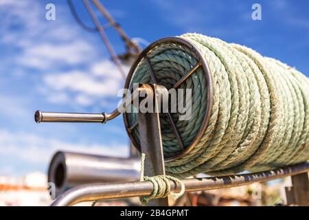 A coil of thick rope on a fishing boat. Alvor Portugal. Stock Photo