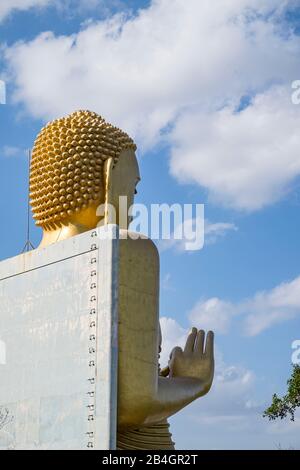 Behind of golden buddha statue with blue sky and cloud Stock Photo - Alamy