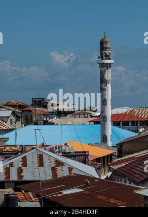 Destination Tanzania, Island Zanzibar: Impressions from Stone Town. View from a roof-top bar to a mosque. Stock Photo