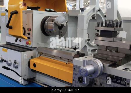 Modern CNC machine tool near. Industry, metal processing Stock Photo