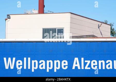 The logo of Wellpappe Alzenau, a manufacturer of packaging aids and packaging materials in Alzenau. Stock Photo