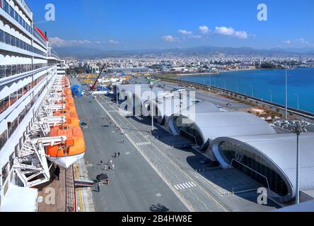 Boat deck of cruise ship Queen Mary 2 with view on cruise terminal Sea and city Limassol, Bay of Akrotiri, Mediterranean Sea, Cyprus Stock Photo