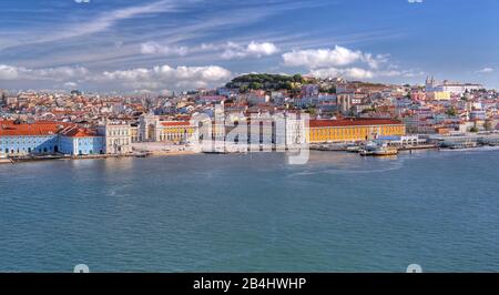 Waterfront of the city center on the Tagus River with the Praca do Comercio Sao Jorge and Se Cathedral, Lisbon, Portugal Stock Photo