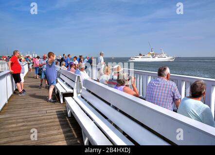 Tourists on the historic pier and pier. Old love with seaside resort Helgoland, North Sea resort Cuxhaven, Elbe estuary, North Sea, North Sea coast, Lower Saxony, Germany Stock Photo