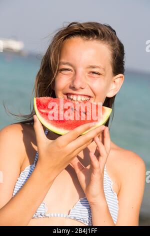 Girl, watermelon, laughing Stock Photo