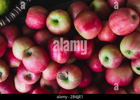 Apples on pile for sale, close-up Stock Photo