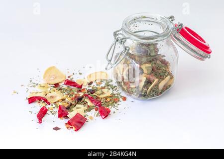 glass jar with homemade preparation for spaghetti dressing 'garlic oil and chilli' Stock Photo