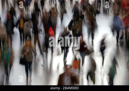 Germany, Bavaria, Munich, people, passers-by, pedestrians, movement, walking, blurred, out of focus Stock Photo