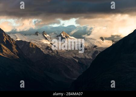 Switzerland, Graubünden, Engadin, Upper Engadine, Bernina, Sella Group, intense dusk Stock Photo