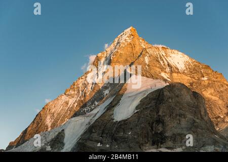 Switzerland, Valais, Haute Route Chamonix Zermatt, dusk on the Matterhorn - Hörnligrat, north face, Zmuttgrat and Liongrat Stock Photo