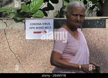 Mumbai, India. 06th Mar, 2020. A woman moves around the premises of Kasturba hospital in Mumbai.A special isolation ward has been setup at the Kasturba hospital for the treatment of the corona virus (COVID-19) patients. Credit: SOPA Images Limited/Alamy Live News Stock Photo