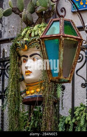 Colorfully decorated and adorned ceramic faces, Taormina, Southern Italy, Europe, Sicily, Italy Stock Photo