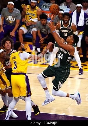 Los Angeles, United States. 07th Mar, 2020. Milwaukee Bucks forward Giannis Antetokounmpo shoots against Los Angeles Lakers Anthony Davis in first quarter action at Staples Center in Los Angeles, March 6, 2020. Photo by Jon SooHoo/UPI Credit: UPI/Alamy Live News Stock Photo