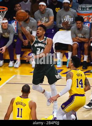 Los Angeles, United States. 07th Mar, 2020. Milwaukee Bucks forward Giannis Antetokounmpo (L) scores on a layup past Los Angeles Lakers Danny Green in first quarter action at Staples Center in Los Angeles, March 6, 2020. Photo by Jon SooHoo/UPI Credit: UPI/Alamy Live News Stock Photo